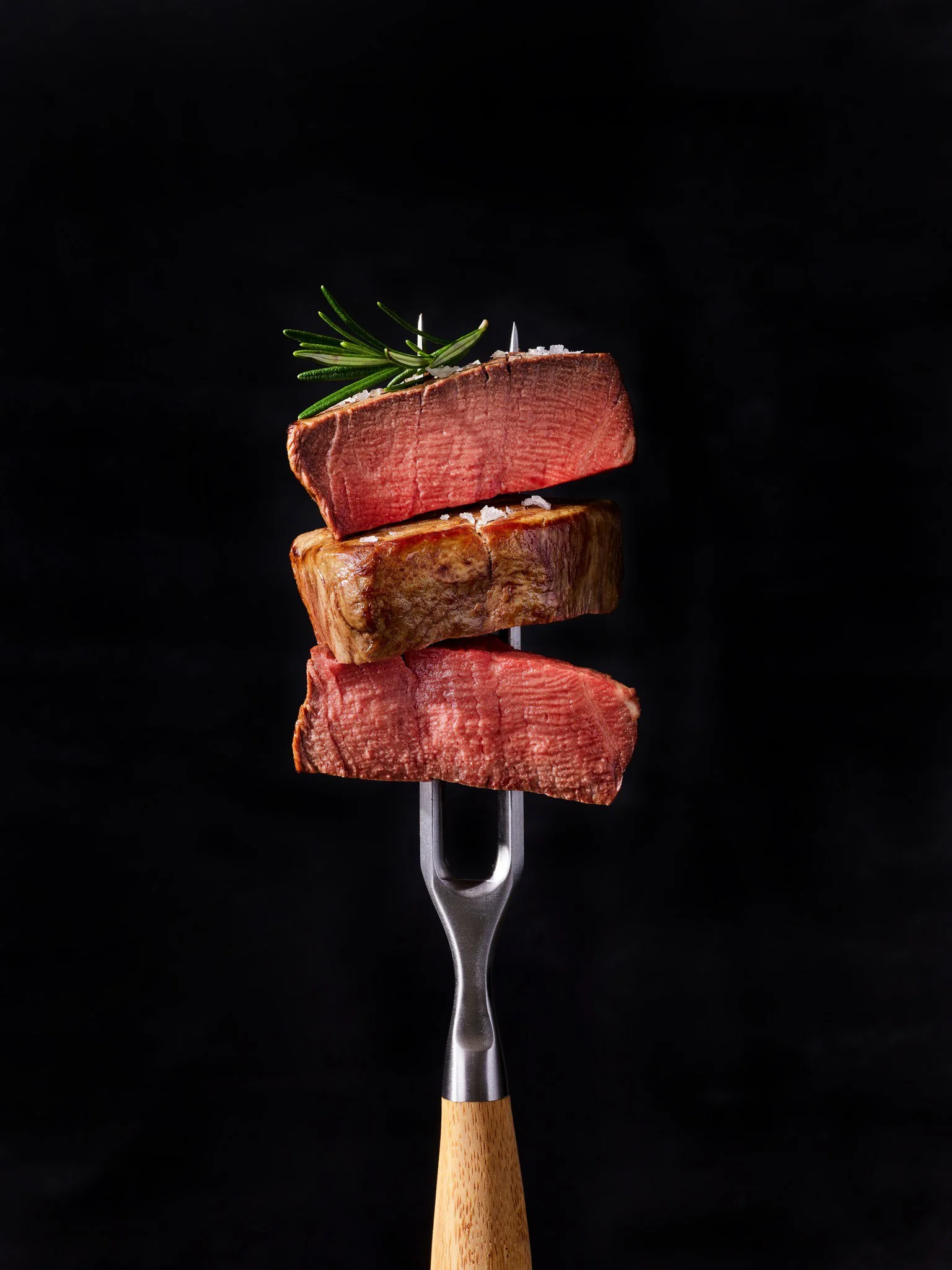 Prime Steak for Group Dining in Fort Lauderdale Allen Brothers USDA prime dry-aged steak sliced for a group dinner at Catch & Cut on Las Olas — best restaurant for groups in Fort Lauderdale (catchandcut.com)